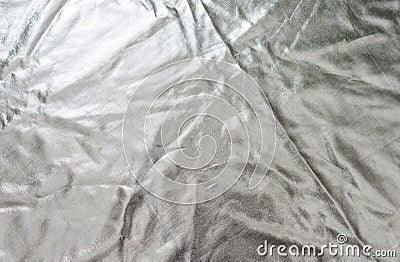 Silvery golden fabric texture background. Stock Photo