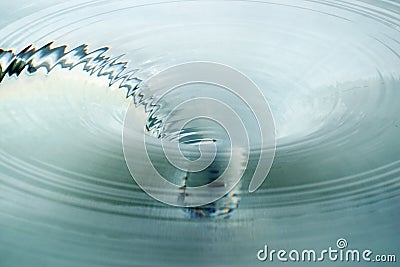Silvery Vortex of Swirling water Stock Photo