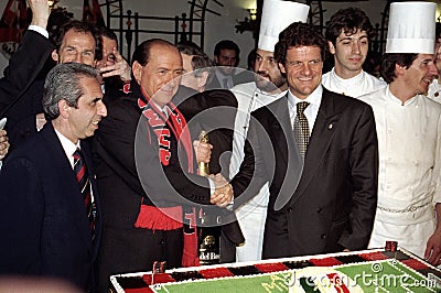 Silvio Berlusconi celebrates the 15th AC Milan Seria A Championship at the restaurant with Fabio Capello Editorial Stock Photo