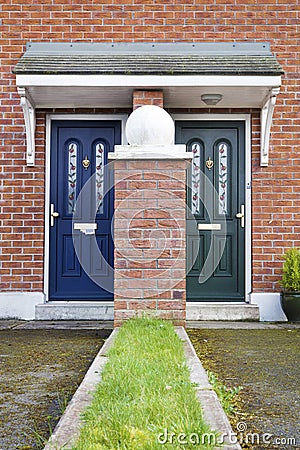 Similar but different entrance door Stock Photo