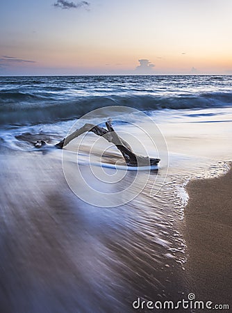 Simple beach sunset shot in long exposure.Copy space. Stock Photo