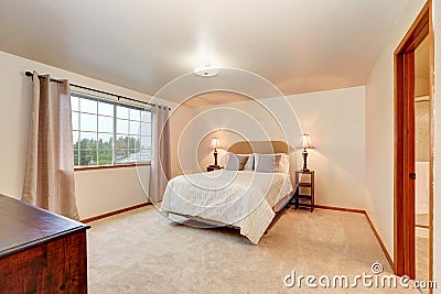 Simple beige bedroom with minimal interior design Stock Photo