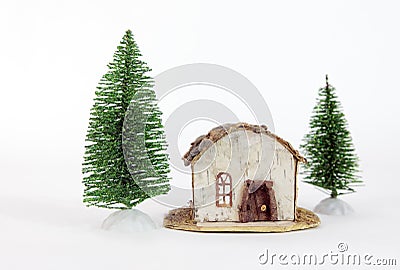 simple cabin and fir trees decoration Stock Photo