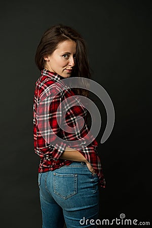 Simple casual clothes. Feeling comfortable. She prefers casual style. Country style. Woman checkered shirt. Attractive Stock Photo