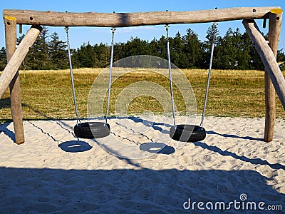 Simple design swing teeter-totter in a playground Stock Photo