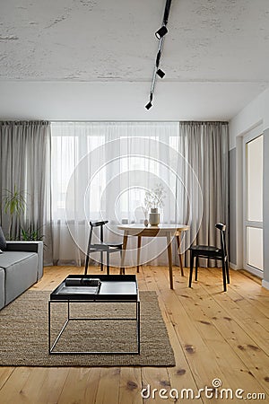 Simple dining area in living room Stock Photo