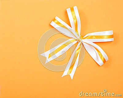 Simple elegant ribbon on orange carton background Stock Photo