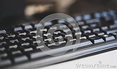 Simple generic black business office computer keyboard object detail, shallow dof, closeup, nobody. Abstract background, no people Stock Photo