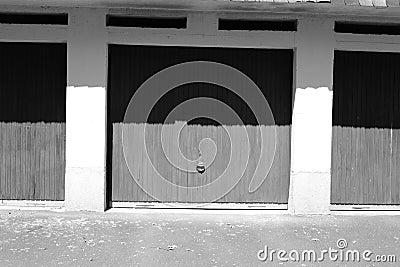 Garages in a row in the sunlight Stock Photo