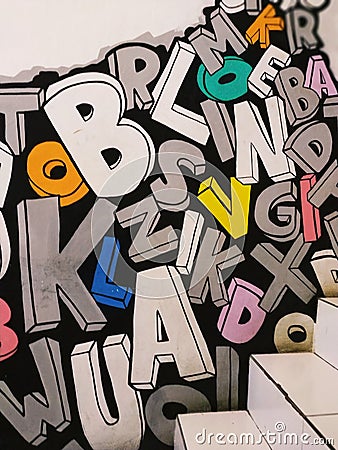 simple graffiti colorful letters on the wall Editorial Stock Photo