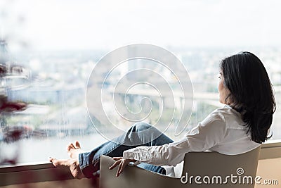 Simple healthy living lifestyle menopause aged Asian woman take a rest relaxing with self awareness, peace of mind, mental health Stock Photo