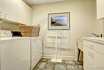 Simple laundry room with old washer and dryer Stock Photo