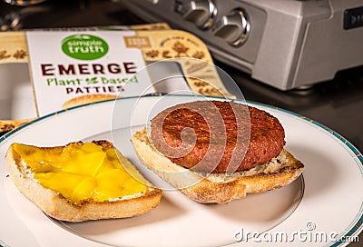 Simple Life Emerge plant based burger in on bun with melted cheese Editorial Stock Photo