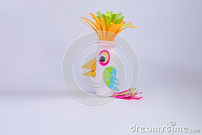 Simple parrot craft for kids, colorful creative bird Stock Photo