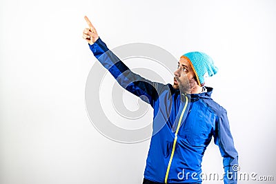 Simple portrait and white background, of a mountaineer man ready to start a challenge in nature Stock Photo