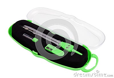 Simple school green compass in a plastic box isolated Stock Photo