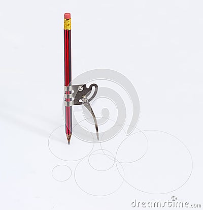 Simple school metal compass with an inserted pencil Stock Photo