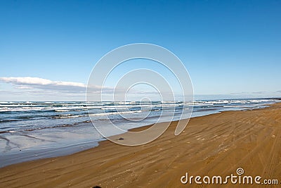 Simple sea view from Chirihama Beach Driveway on Noto Peninsula, Japan, with car tyre tracks on sand Stock Photo