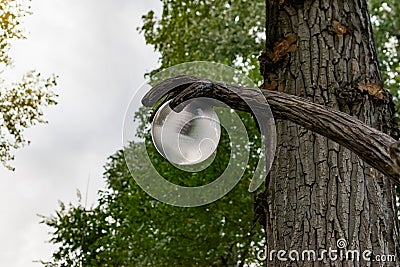 Simple street lights under the open sky. Black metal frame and dusty white glass Stock Photo