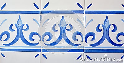 Simple tiles with rustic ornate of white and blue colour. Curly floral ornament. Traditional Spanish wall decoration Stock Photo