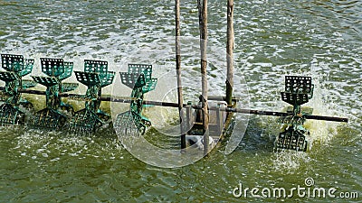 Simple Water Turbines Fishing Pond Stock Photo