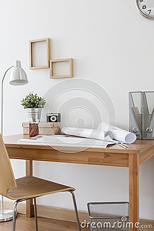 Simple wooden desk and chair Stock Photo