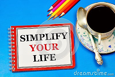 Simplify your life. A text label in the planning notebook. Stock Photo