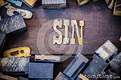 Sin Concept Rusty Type Stock Photo