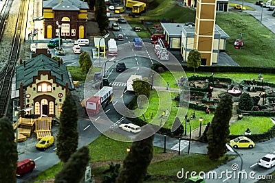 Toy railroad layout with buildings, peoples, ambulances Editorial Stock Photo