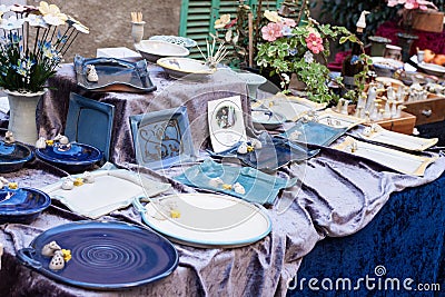 Blue and white ceramic tableware for sale at Sineu market Editorial Stock Photo