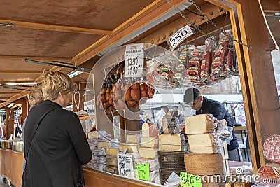 Sineu Majorca. Woman looking at a market stall that sells spanish typical products Editorial Stock Photo