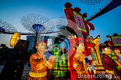 Singapore Chinese Mid-Autumn Lantern Festival at Garden By The Bay overseeing Marina Bay Sands Hotel in Editorial Stock Photo