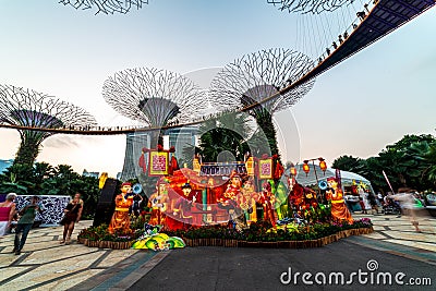 Singapore Chinese Mid-Autumn Lantern Festival at Garden By The Bay overseeing Marina Bay Sands Hotel in Editorial Stock Photo