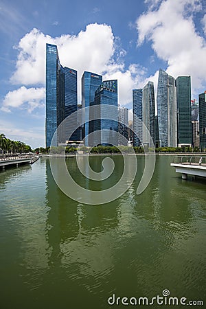 Singapore commercial and banking skyscrapers seen from Marina Bay Sands Shopping Centre at Singapore Harbour Editorial Stock Photo