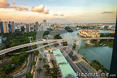 Cityscape from a height from the Singapore Flyer In the evening, the beautiful golden sky, the view of Editorial Stock Photo