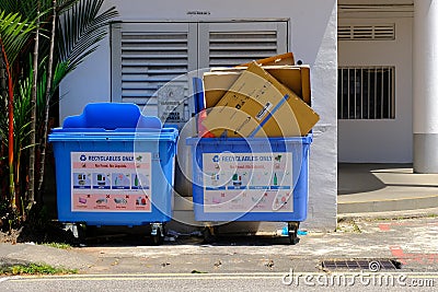 Singapore Feb2020 Common non-sorting blue recycling bins for paper, metal, plastic, and glass at Tiong Bahru HDB estate. They Editorial Stock Photo