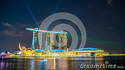 Beautiful laser show at Marina Bay waterfront in Singapore at night. Wonderful laser show and water in Editorial Stock Photo
