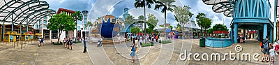 SINGAPORE - JANUARY 3, 2020: Tourists and locals enjoy Sentosa Park on a cloudy day, panoramic view Editorial Stock Photo