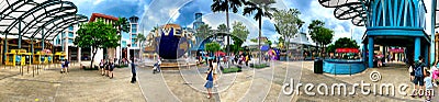 SINGAPORE - JANUARY 3, 2020: Tourists and locals enjoy Sentosa Park on a cloudy day, panoramic view Editorial Stock Photo