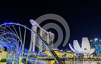 SINGAPORE - JULY 8,2016 : Helix Bridge and Marina Bay Sand Hotel Editorial Stock Photo