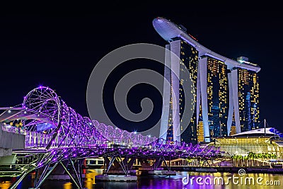 SINGAPORE - JULY 8,2016 : Helix Bridge and Marina Bay Sand Hotel Editorial Stock Photo