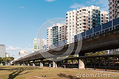 Singapore-24 MAR 2018: A transit subway on elevated rails through a public housing estate Editorial Stock Photo