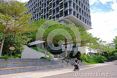 Singapore May2020 View of Khoo Teck Puat hospital in Yishun HDB heartland neighbourhood. The lush, eco friendly green building is Editorial Stock Photo