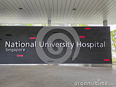 Singapore National University Hospital banner in front of the hospital Editorial Stock Photo