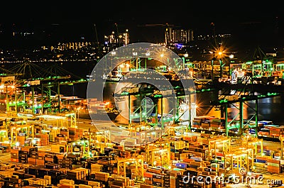 Aerial view of busiest cargo port with hundreds of ships loading export and import goods and thousands of containers in harbr Editorial Stock Photo