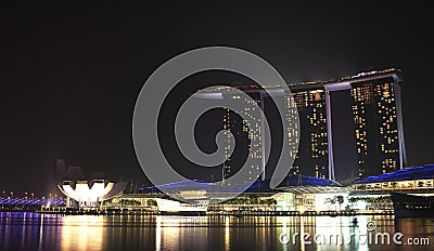 Singapore - October 12th of 2015: Main view of Marina Bay Sands Hotel in background night. Editorial Stock Photo