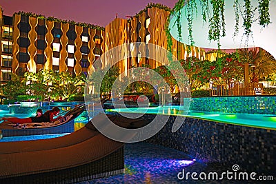 Singapore sentosa out post hotel outdoor swimming pool with bar Editorial Stock Photo