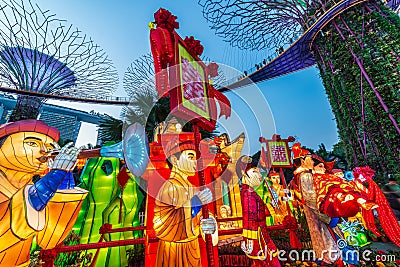 Singapore / September 06 2019 : Chinese Mid-Autumn Lantern Festival at Garden By The Bay overseeing Marina Bay Sands Hotel in Editorial Stock Photo