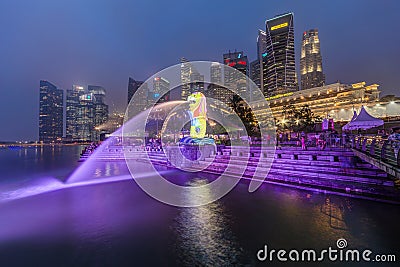 Singapore, Singapore - circa September 2015: Merlion Statue and Fontain in Singapore by night Editorial Stock Photo