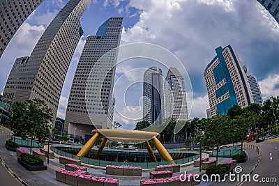 SINGAPORE, SINGAPORE - JANUARY 30. 2018: Outdoor view of fountain wealth with a public residential condominium building Editorial Stock Photo